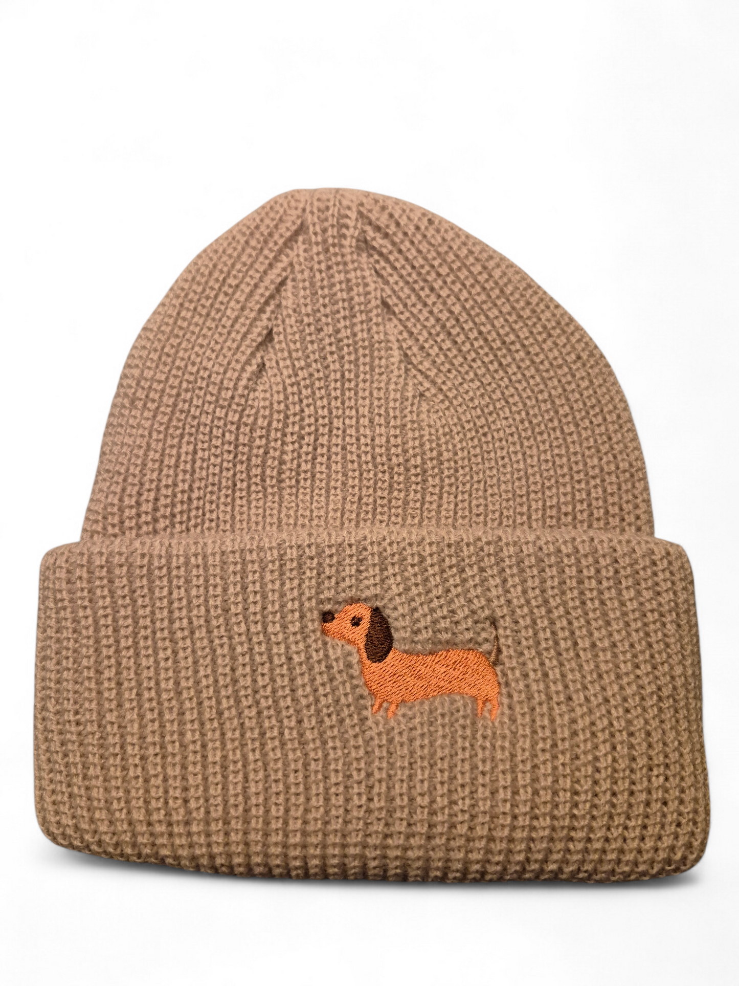 Warme muts met geborduurd teckeltje