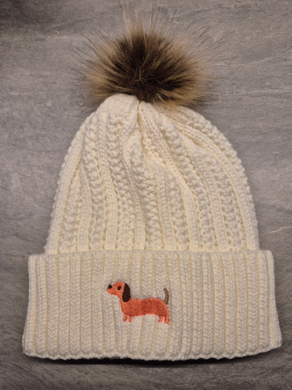 Warme teckelmuts met pompon