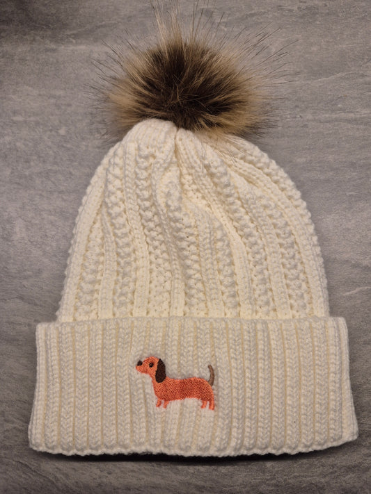 Warme teckelmuts met pompon