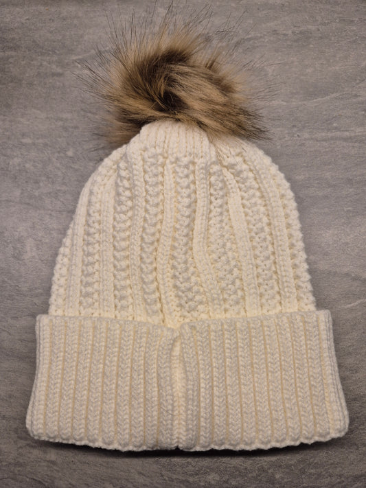 Warme teckelmuts met pompon