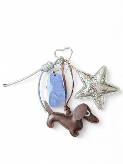 Teckel bag charm chocotan silver star