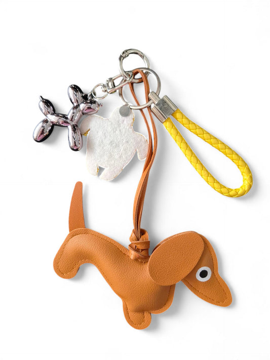 Teckel bag charm met schildpad
