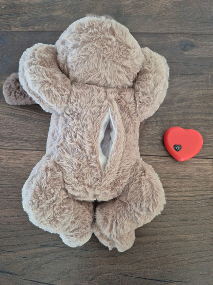 Rustgevende hondenknuffel met 'hartslag'