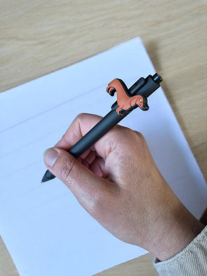 Set van twee teckelpennen met 'rode' teckel