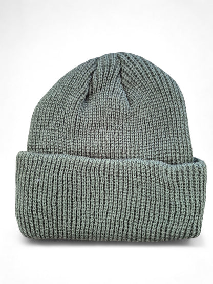 Warme muts met geborduurd teckeltje